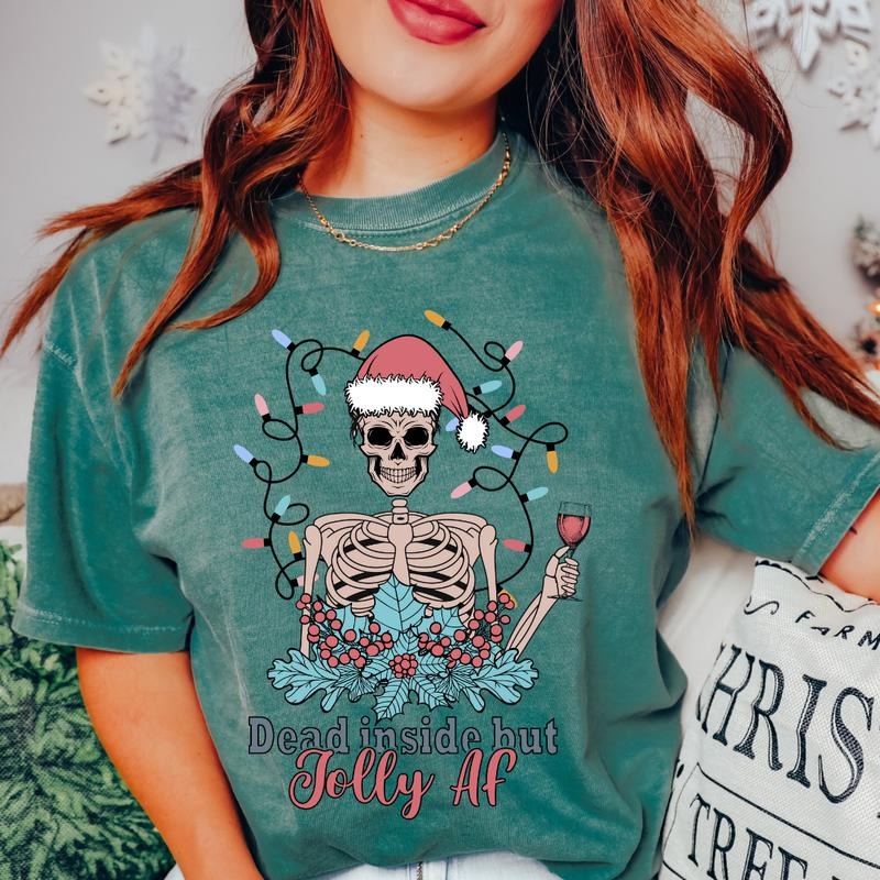DEAD INSIDE BUT JOLLY AF T-SHIRT (COMFORT COLORS T-SHIRT, CASUAL SHIRT UNISEX, CHRISTMAS CLOTHING, GRAPHIC APPAREL, HOLIDAY SHIRT) Cotton Fabric