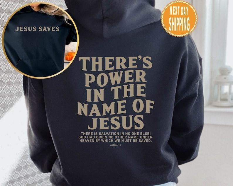 There's Power In The Name Of Jesus Hoodie, There's Power In The Name Of Jesus Shirt, Trendy Faith Shirt, Jesus Saves T-shirt, sweater and Hoodie
