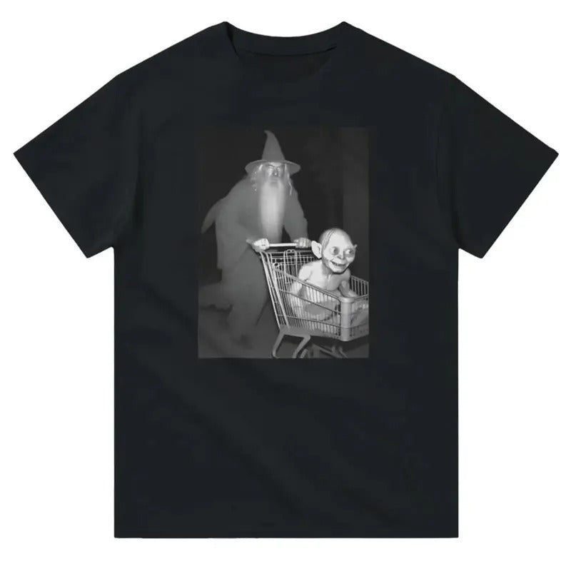 Wizard Pushing a Goblin into a Shopping Cart at Night - Funny Graphic Tee Top