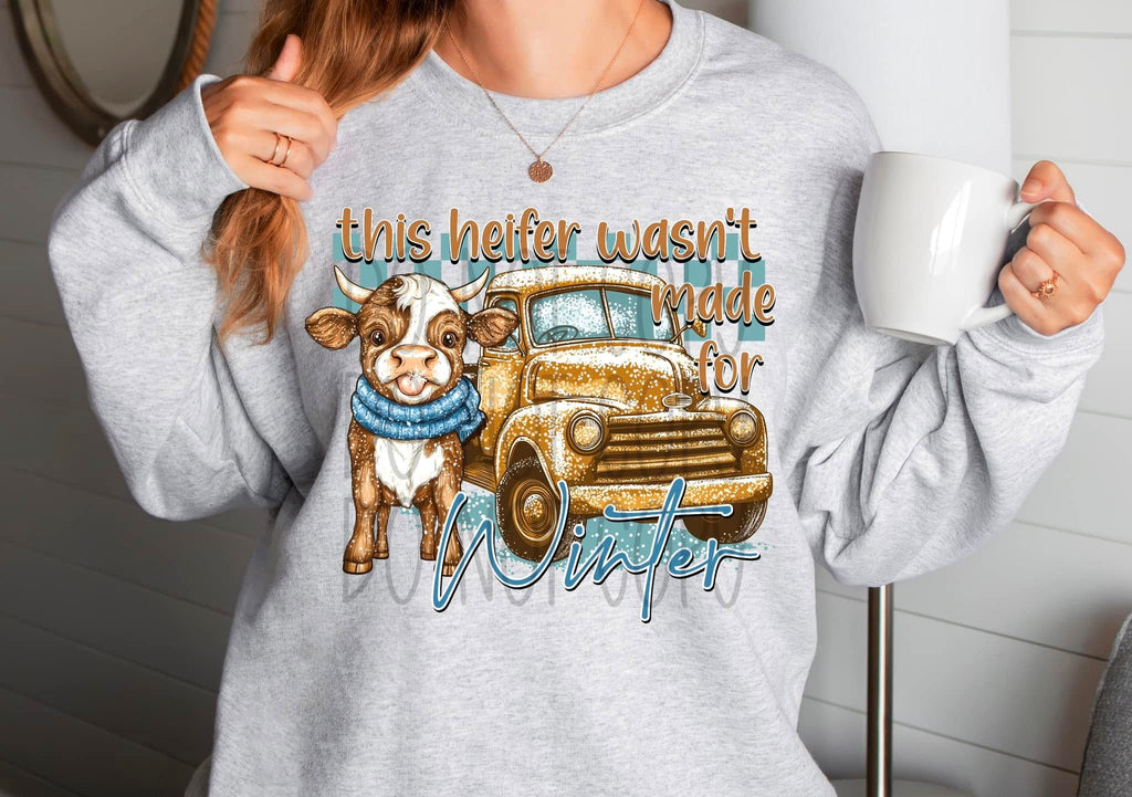 THIS HEIFER WASN'T MADE FOR WINTER SWEATSHIRT T-Shirts, Hoodie | CoreVibeTees.com (Image 1)