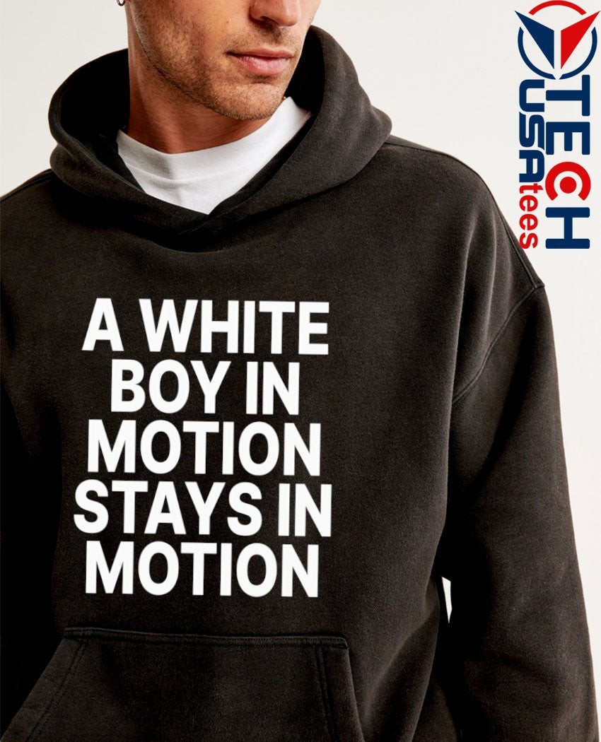 A white boy in motion shirt