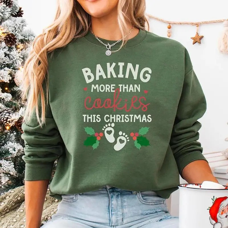 Baking More Than Cookies This Christmas Sweatshirt, Christmas Pregnancy Reveal Shirt, Christmas Holiday Maternity Sweatshirt, Christmas Pregnant Shirt, Winter Pregnancy Announcement Sweater, Baby Reveal Xmas Party Shirt
