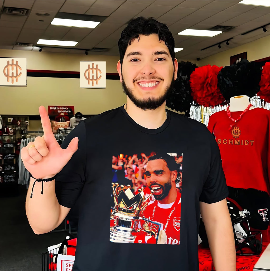 David Raya after winning Premier League Champions 2026 title shirt