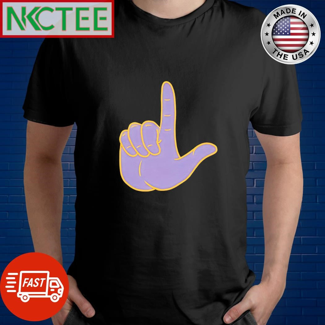 L Up sign hand LSU shirt