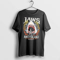 Original Riot Society Jaws Amity Island Welcomes You Shark Eating Boat Black Tshirts