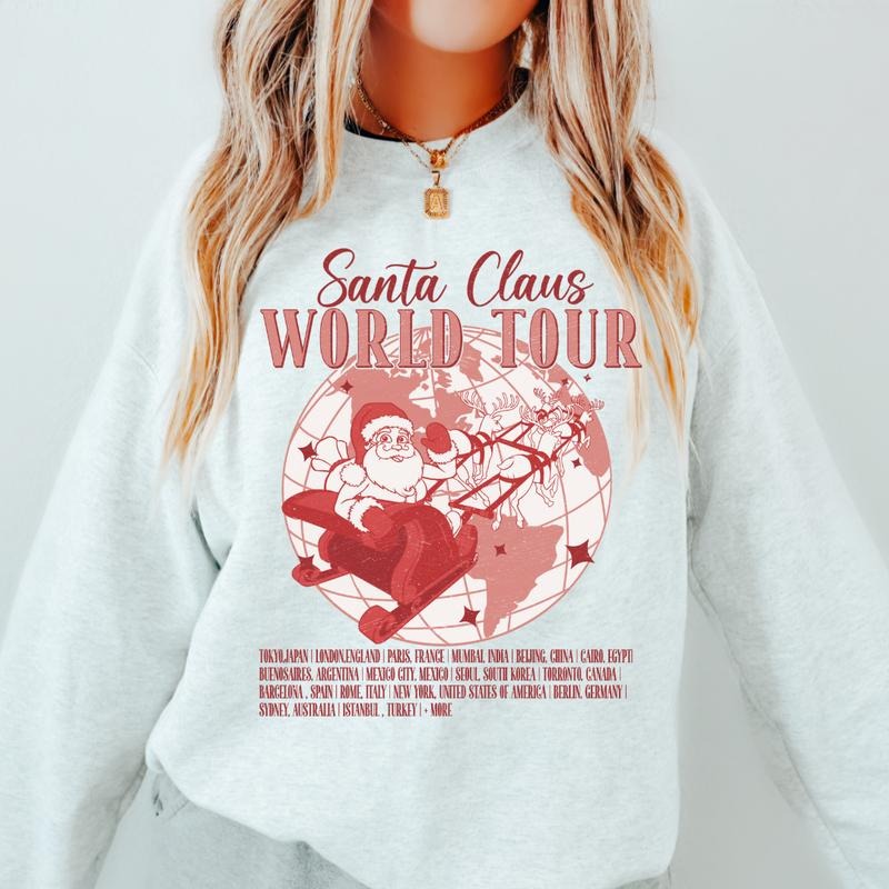 SANTA CLAUS WORLD TOUR CREWNECK (Crewneck Sweatshirt, Unisex Fit, Causal Sweatshirt for Christmas, Christmas Holiday Sweatshirt) Womenswear Hoodie