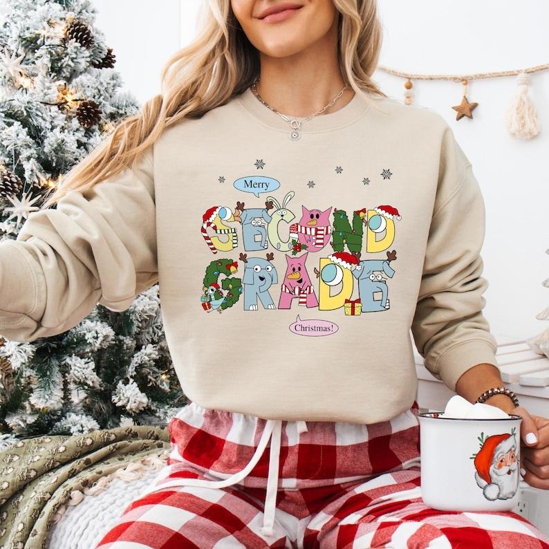 Second Grade Teacher Christmas Sweatshirt, 2nd Grade Christmas T-shirt, Elephant And Piggie Christmas Shirt, Santa's Favorite Teacher Tee