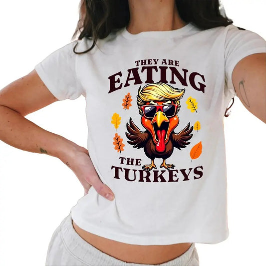 They Are Eating The Turkeys Funny Political Turkey Baby Tee, Thanksgiving Trump Humor Baby Tee, Funny Thanksgiving Unisex Tee Casual Comfort