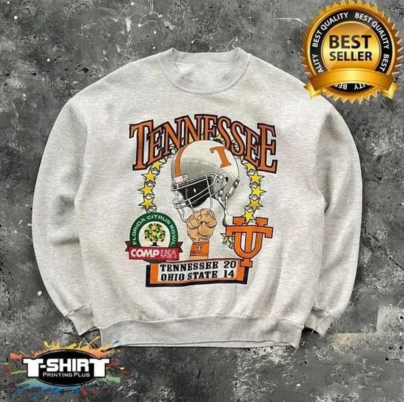 Vintage NCAA Tennessee Volunteers Helmet Unisex Sweatshirt Cotton Fabric T-Shirts, Hoodie | CoreVibeTees.com