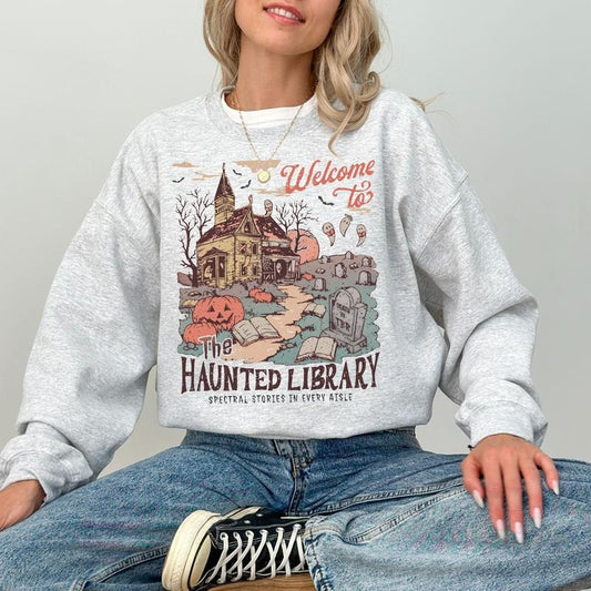Welcome To The Haunted Library Sweatshirt, Bookish Halloween Tee Shirt, Funny Halloween Librarian Graphic T-Shirt, Ghost Reading Book Sweater, Gift For Halloween