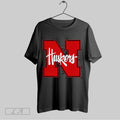 Top Honoring The Legacy Greg Sharpe Voice Of The Huskers 2025 T Shirt Hoodie, Sweatshirt | CoreVibeTees.com
