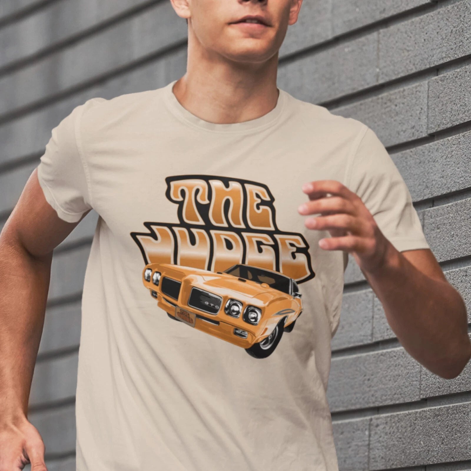 Classic car Unisex T-shirt featuring orange 70 Pontiac GTO Judge muscle car