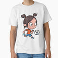 girl with ponytails successfully leads a soccer ball by duxpavlic