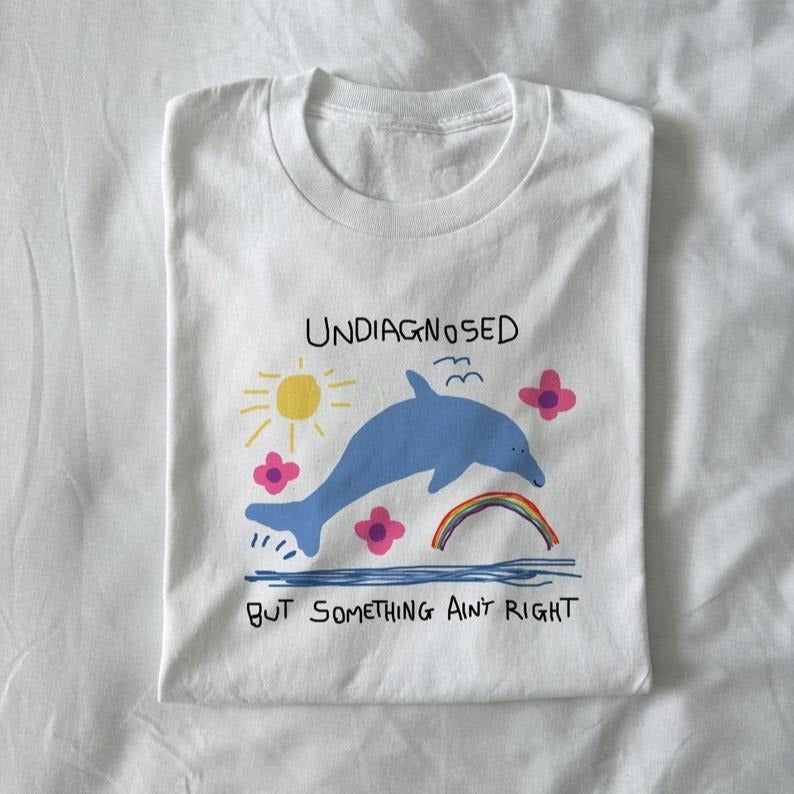 undiagnosed but something ain't right - silly t shirt, joke t shirt, meme t shirt, dolphin meme, dolphin t shirt, funny shirt