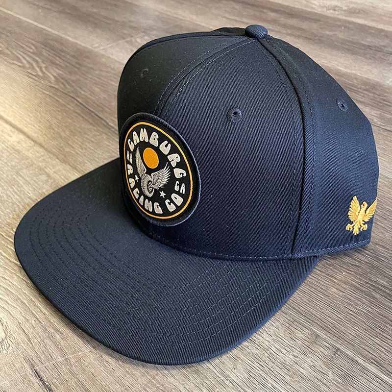 Camburg Winged Wheel Trucker Cloth Hat – Black
